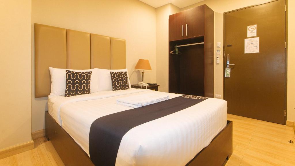 Postel nebo postele na pokoji v ubytování Asrodel Hotel RedPartner