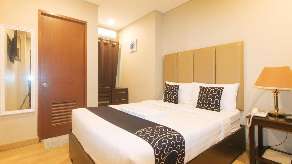 Postel nebo postele na pokoji v ubytování Asrodel Hotel RedPartner