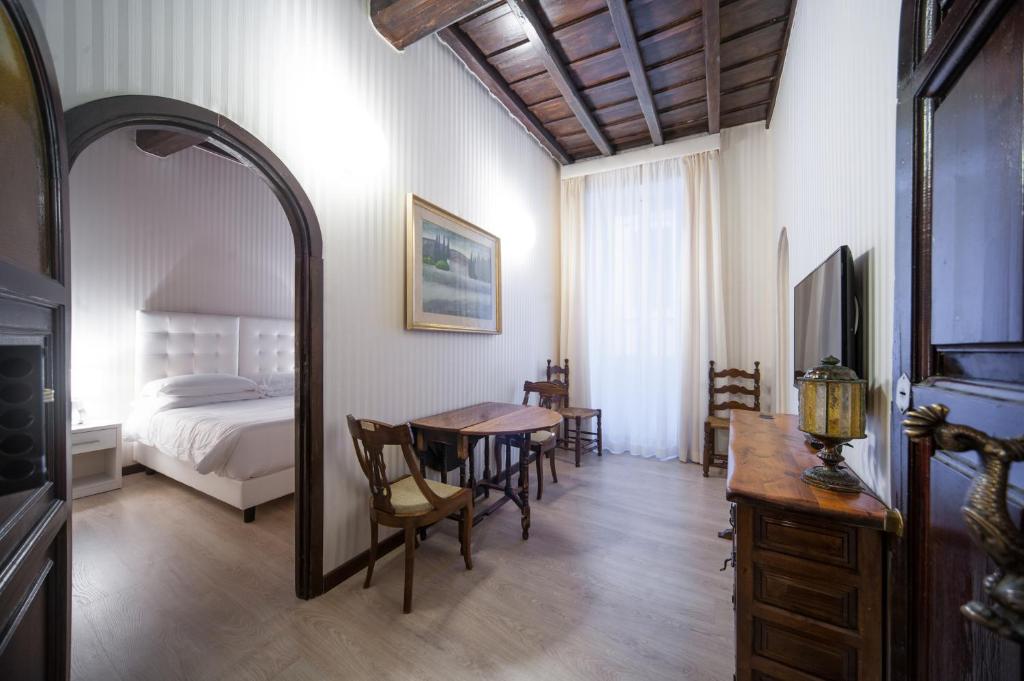 TV a/nebo společenská místnost v ubytování Trevi 41 Hotel
