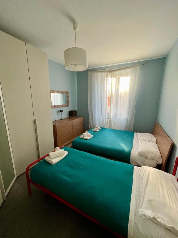 A bed or beds in a room at PRIVATEHOUSEINROME