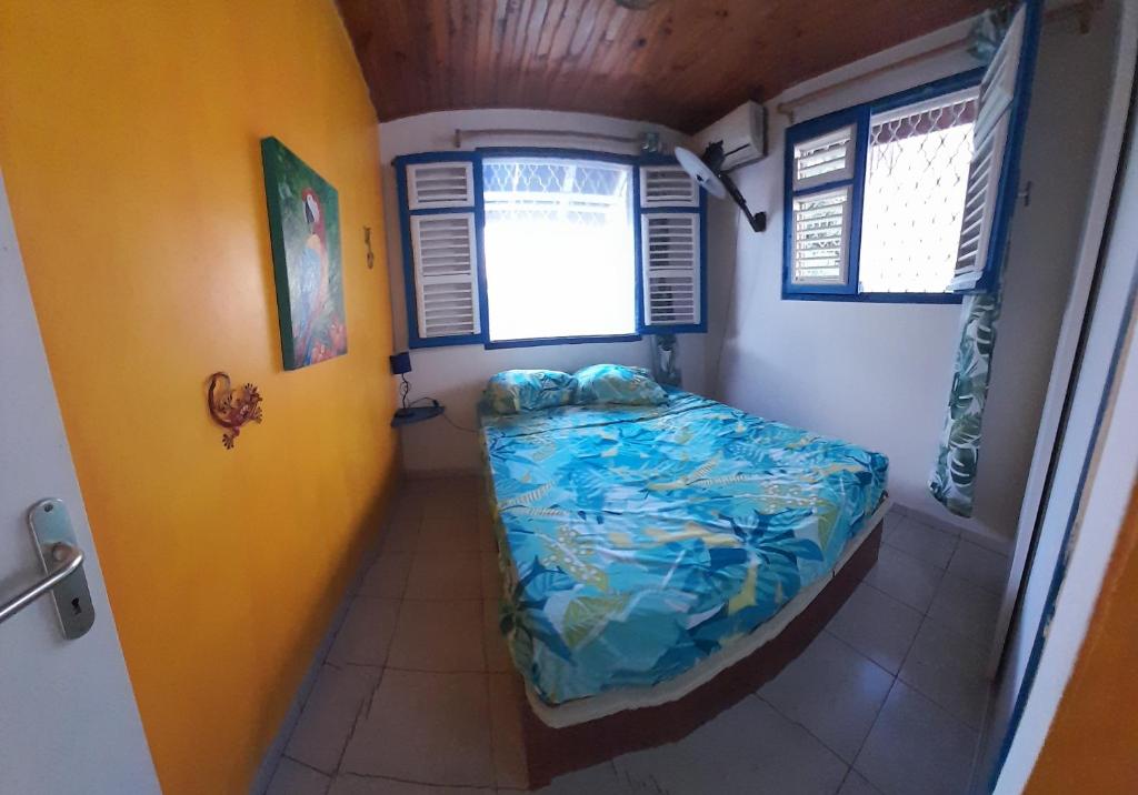 Postel nebo postele na pokoji v ubytování Chambre d'hôte la Calebasse
