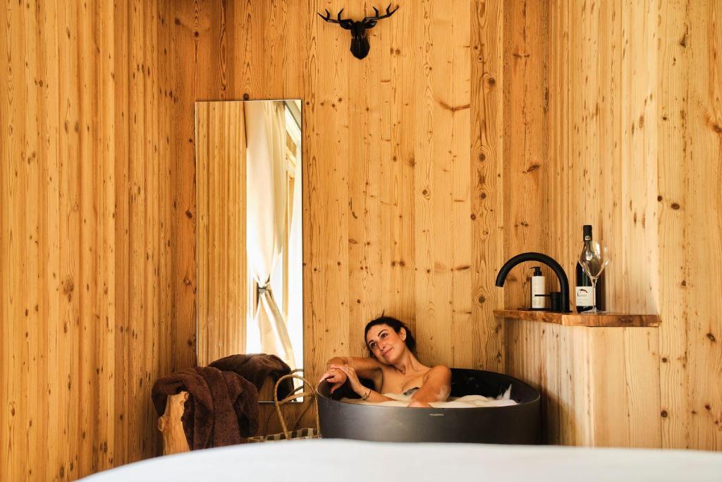 Postel nebo postele na pokoji v ubytování Boutique Hotel e Chalets Salvadori