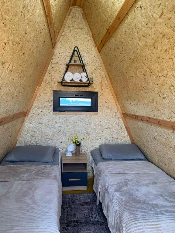 Postel nebo postele na pokoji v ubytování Wild Rest