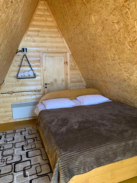 Postel nebo postele na pokoji v ubytování Wild Rest
