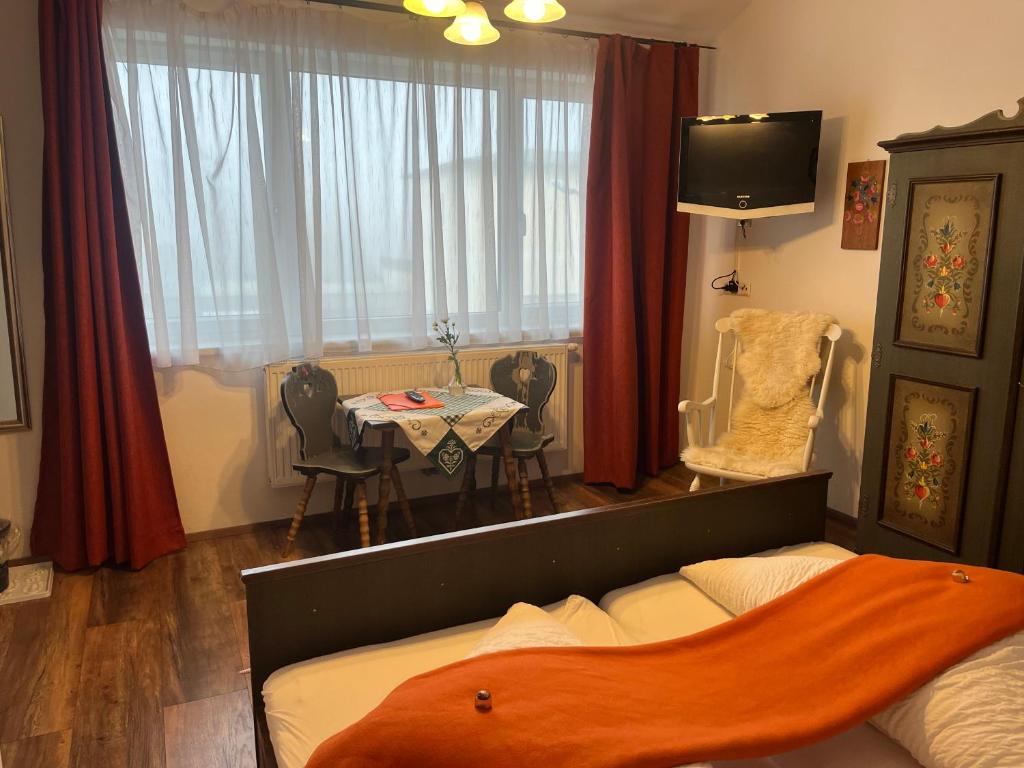 Postel nebo postele na pokoji v ubytování Pension Marillenhof