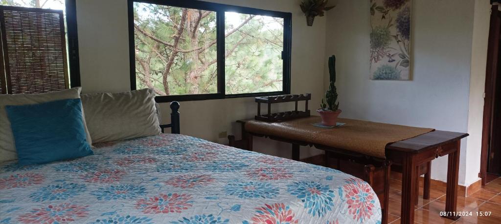 Postel nebo postele na pokoji v ubytování La Roca- Cabañas de montaña