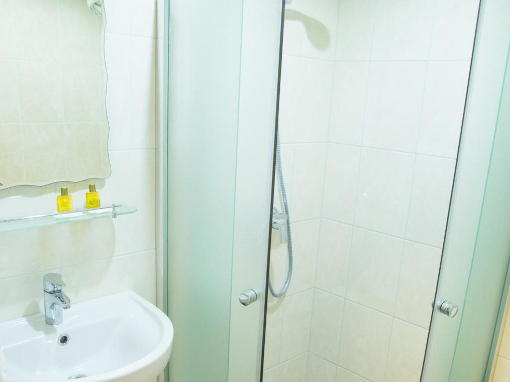 Koupelna v ubytování Ankur Hotell