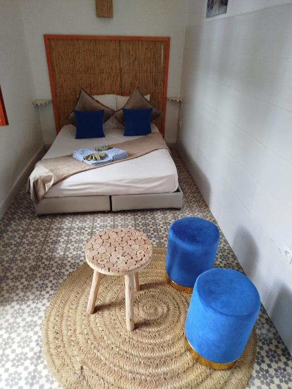 Postel nebo postele na pokoji v ubytování Riad Bab Lakhmiss
