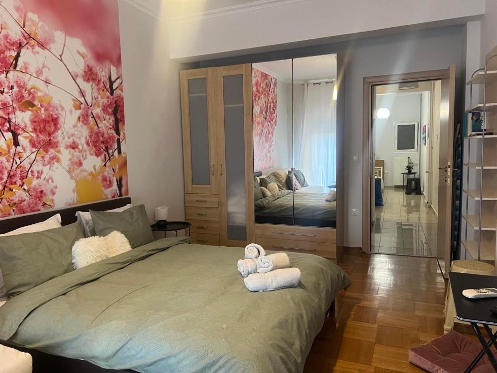 Posteľ alebo postele v izbe v ubytovaní Acropolis Urban Flat