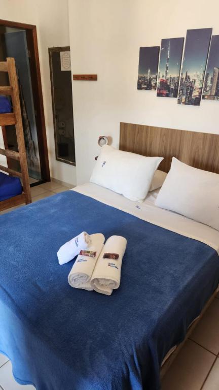 Cama ou camas em um quarto em Hope Pousada