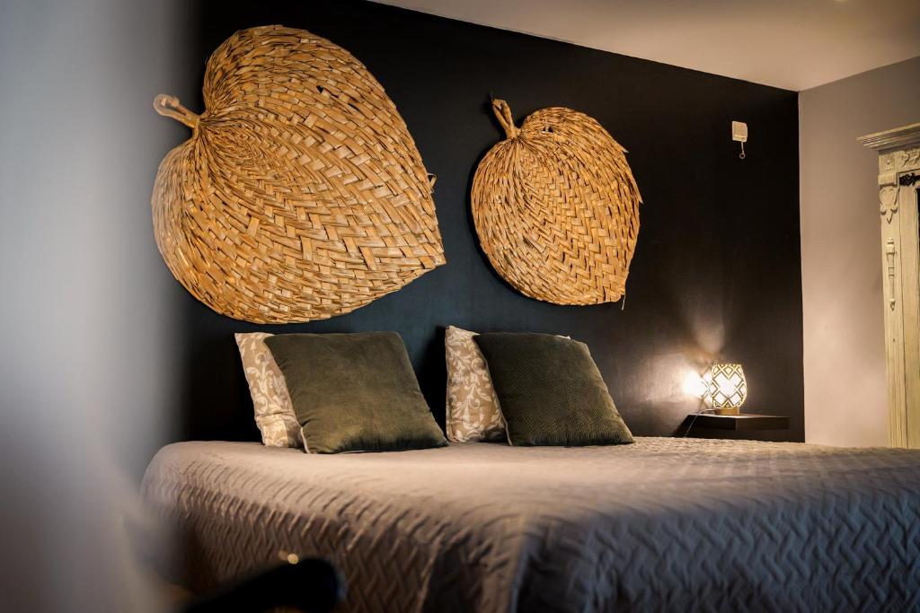 Postel nebo postele na pokoji v ubytování Gîte la casa del cookie