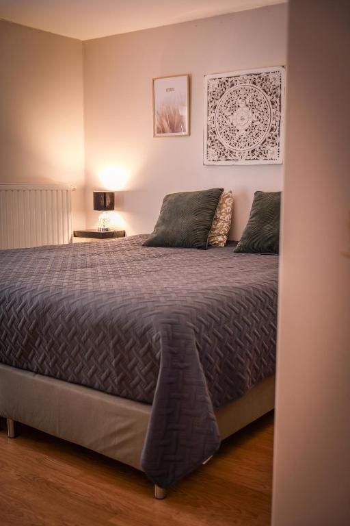 Postel nebo postele na pokoji v ubytování Gîte la casa del cookie