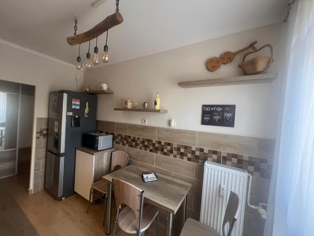 Kuchyň nebo kuchyňský kout v ubytování Centrum Apartman