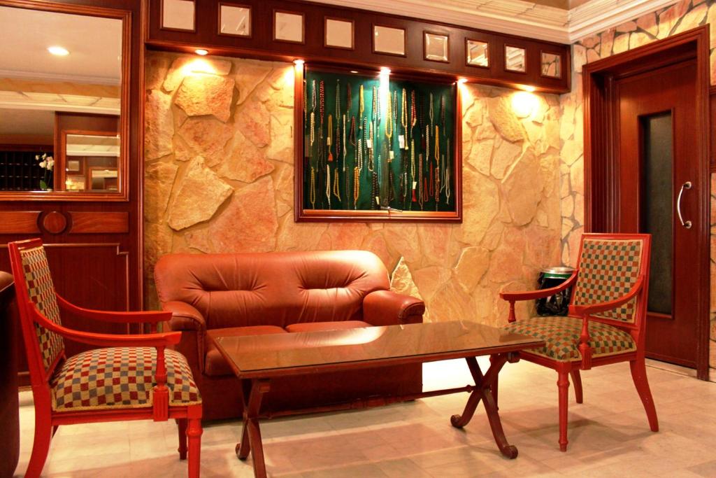 Posezení v ubytování Le Marly Hotel