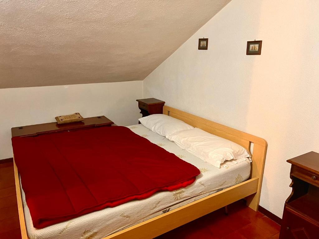 Postel nebo postele na pokoji v ubytování ECHI di Ovindoli