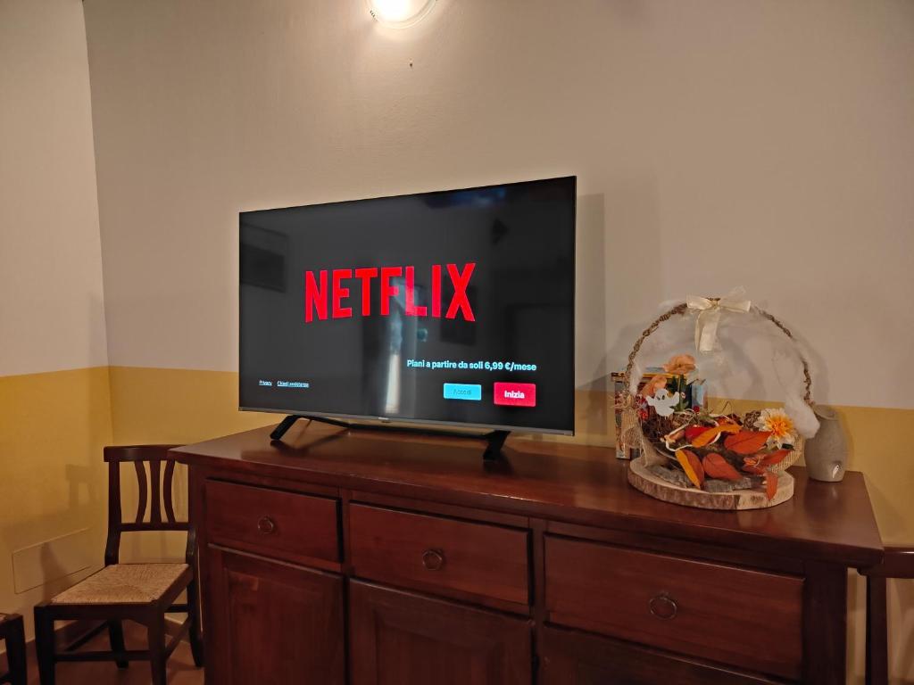 TV a/nebo společenská místnost v ubytování Casa Fra Ambrogio