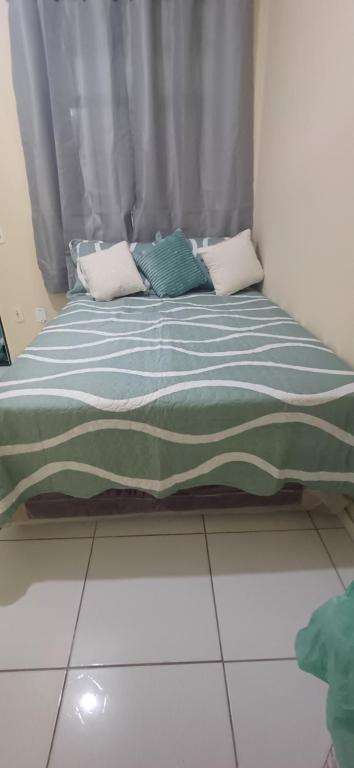 En eller flere senge i et værelse på Lar da praia