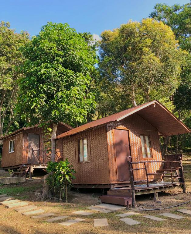 a small house in the middle of a forest at Mount Avangan Eco Adventure Park in Coron