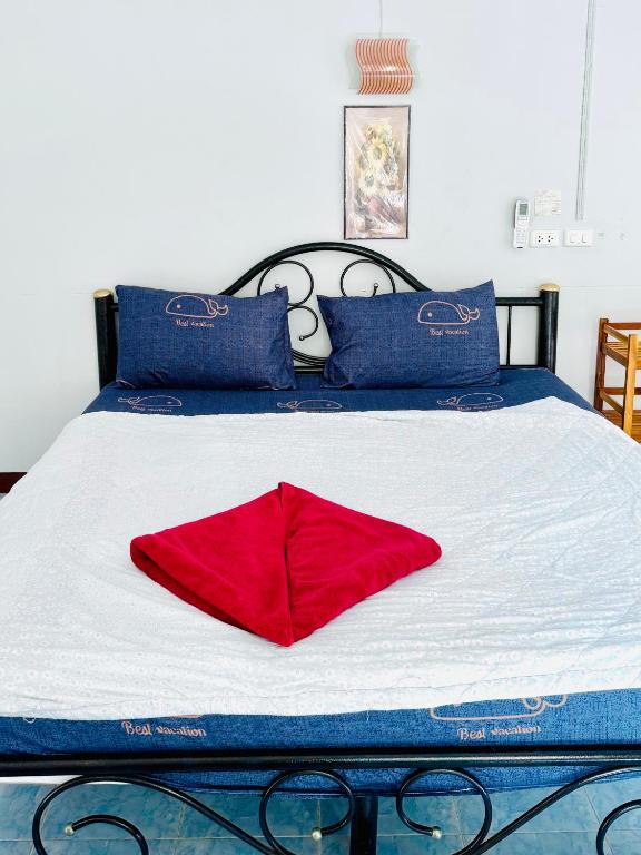 Postel nebo postele na pokoji v ubytování TAMONWAN HOUSE Koh Tao