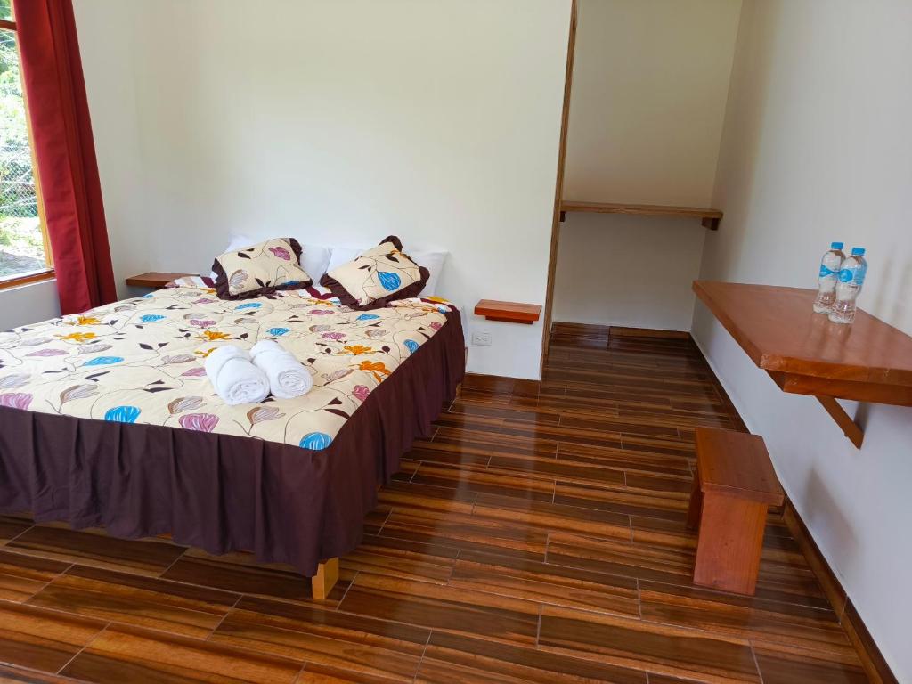 Postel nebo postele na pokoji v ubytování CABAÑAS GOLDEN TANAGER