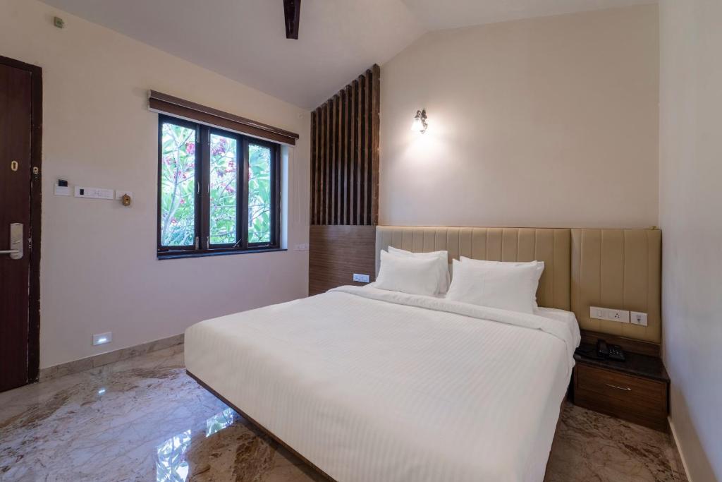 Postel nebo postele na pokoji v ubytování Palette - Coastal Grand Hotels & Resorts, OMR