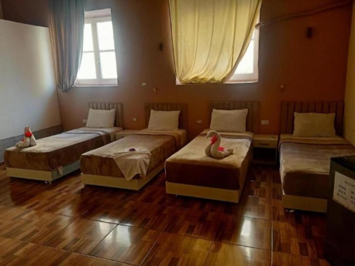 Postel nebo postele na pokoji v ubytování New court