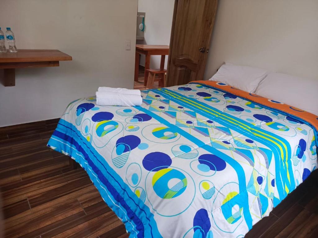 Postel nebo postele na pokoji v ubytování CABAÑAS GOLDEN TANAGER