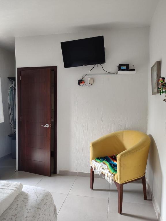TV a/nebo společenská místnost v ubytování Hostal Casa Morada