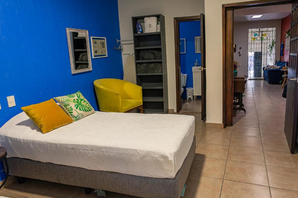 Postel nebo postele na pokoji v ubytování Hostal Casa Morada