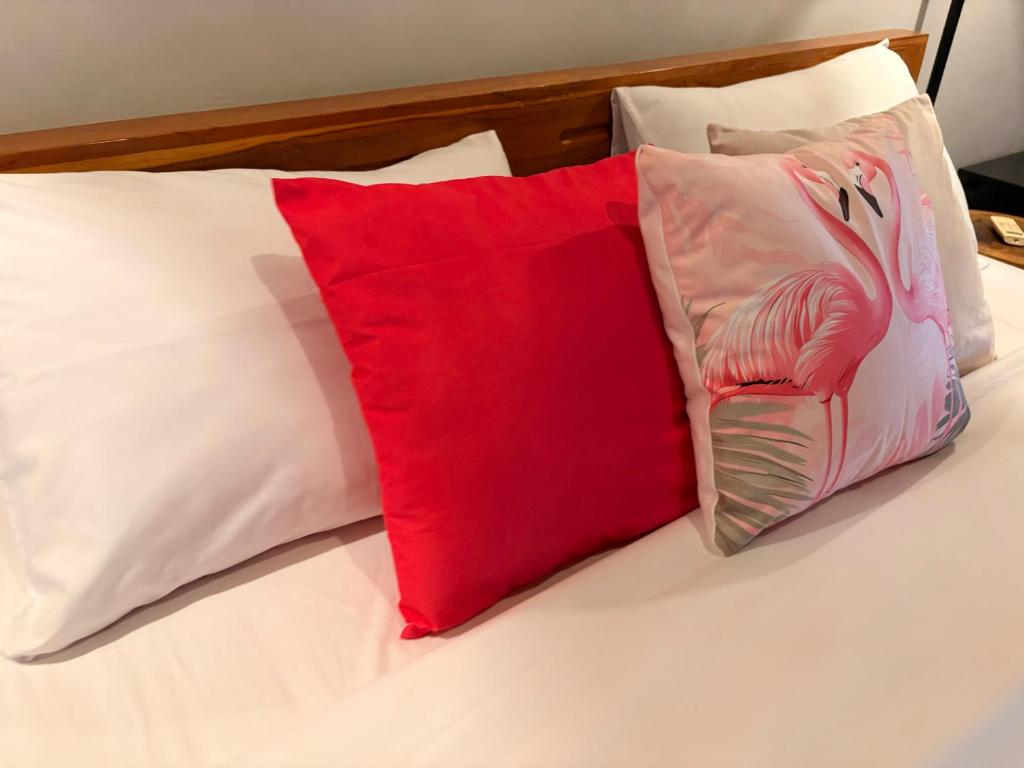 Postel nebo postele na pokoji v ubytování Pink Flamingo