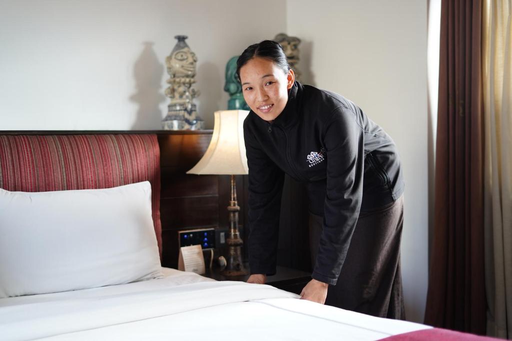 Postel nebo postele na pokoji v ubytování Dalai-La Boutique Hotel