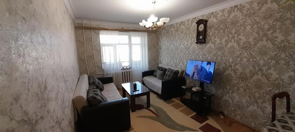 TV a/nebo společenská místnost v ubytování Guest house with local family