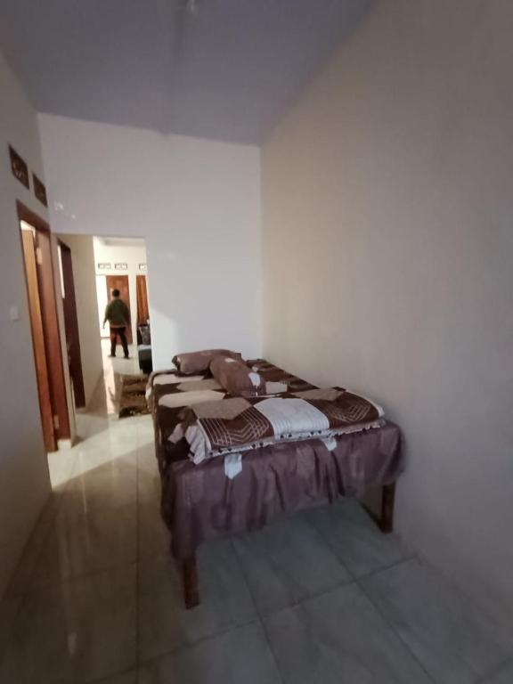 Postel nebo postele na pokoji v ubytování Oryza villa