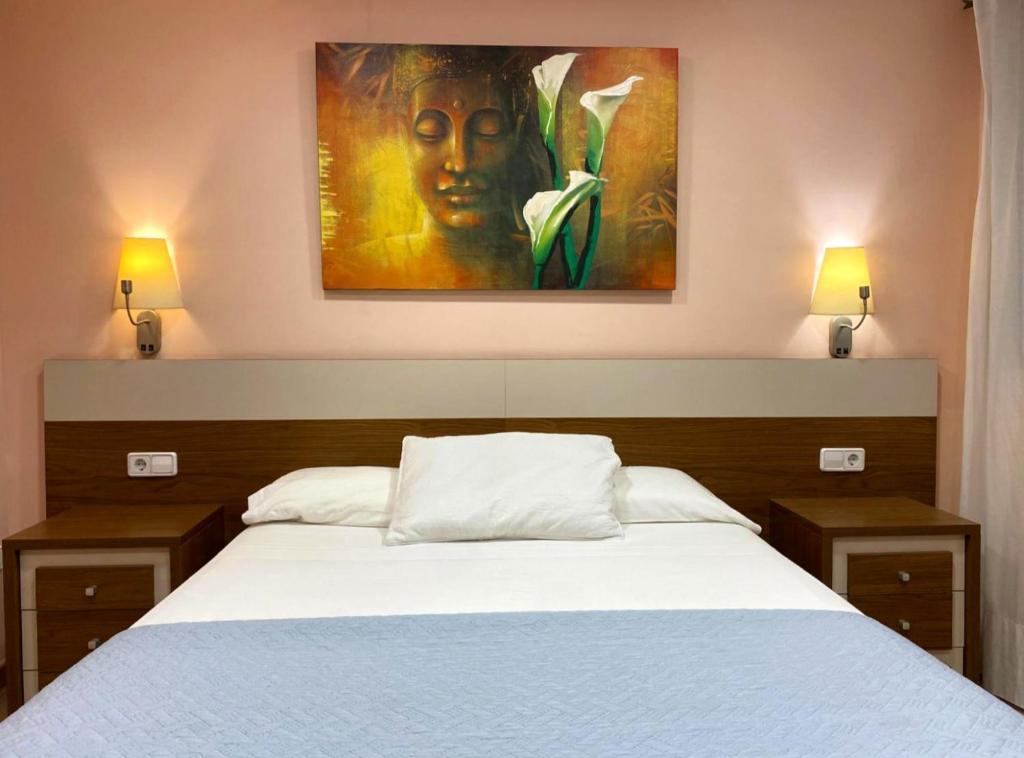 Postel nebo postele na pokoji v ubytování Hotel Llar de Capitans