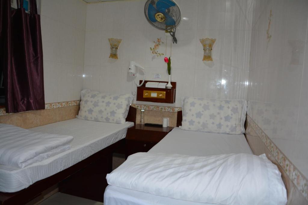 Postel nebo postele na pokoji v ubytování Everest Guest House