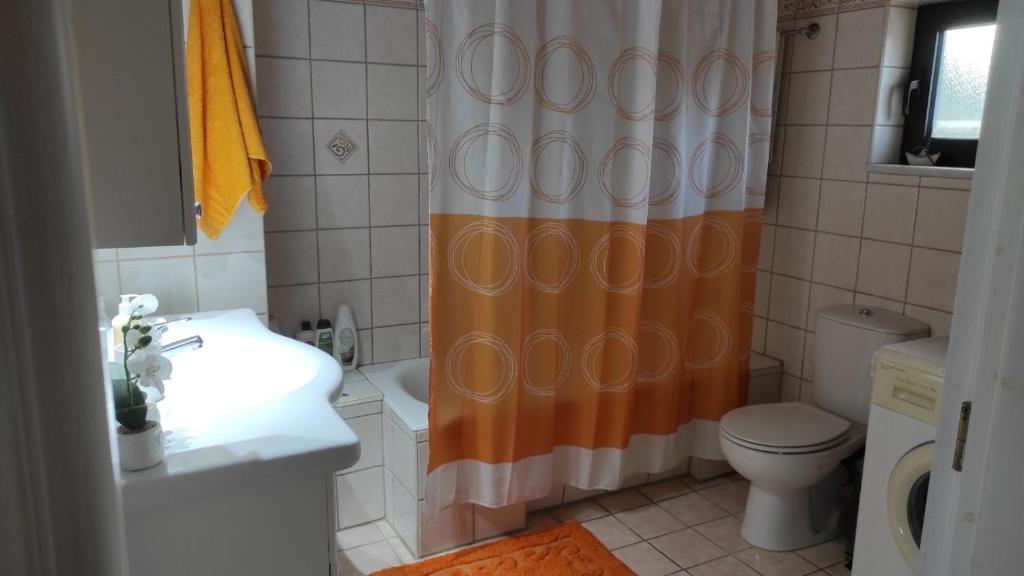 Koupelna v ubytování Lena s Apartment