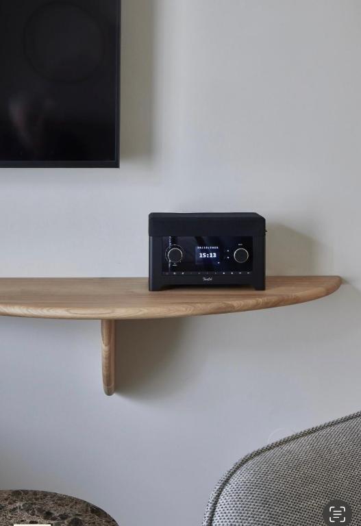 ADELANTE Boutique Hotelにあるテレビまたはエンターテインメントセンター