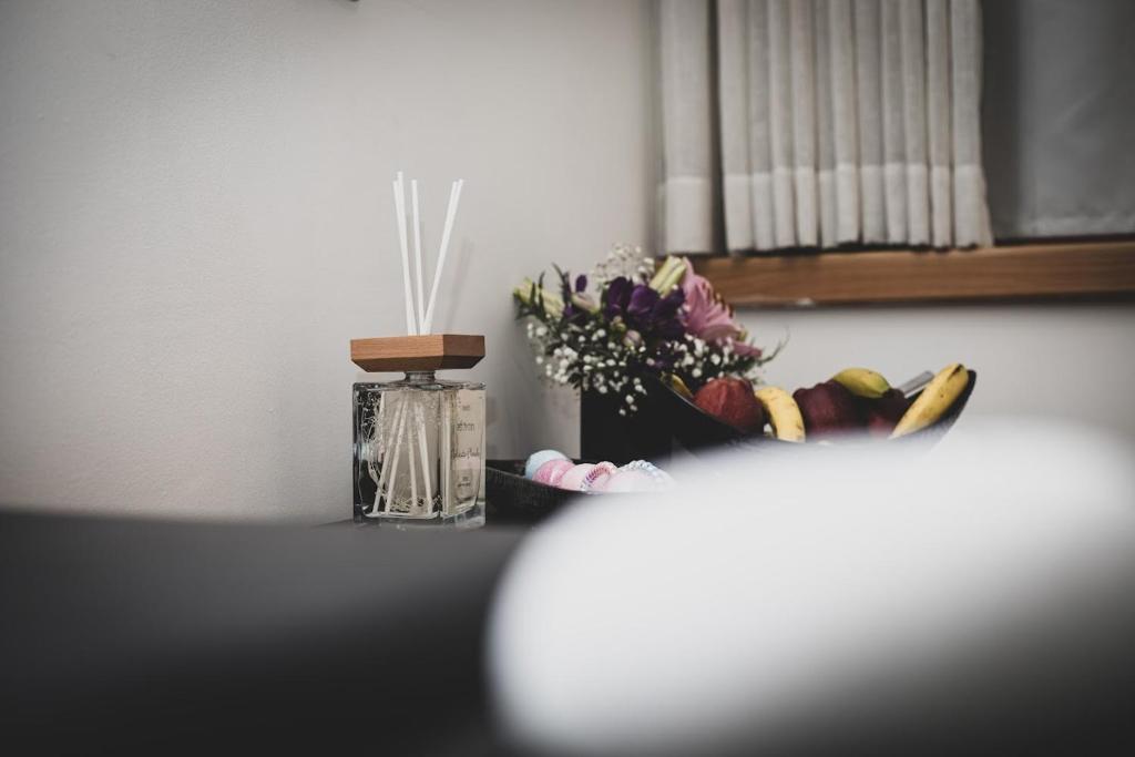 Postel nebo postele na pokoji v ubytování Inbar Hotel