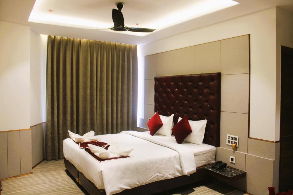 Postel nebo postele na pokoji v ubytování Hotel k11