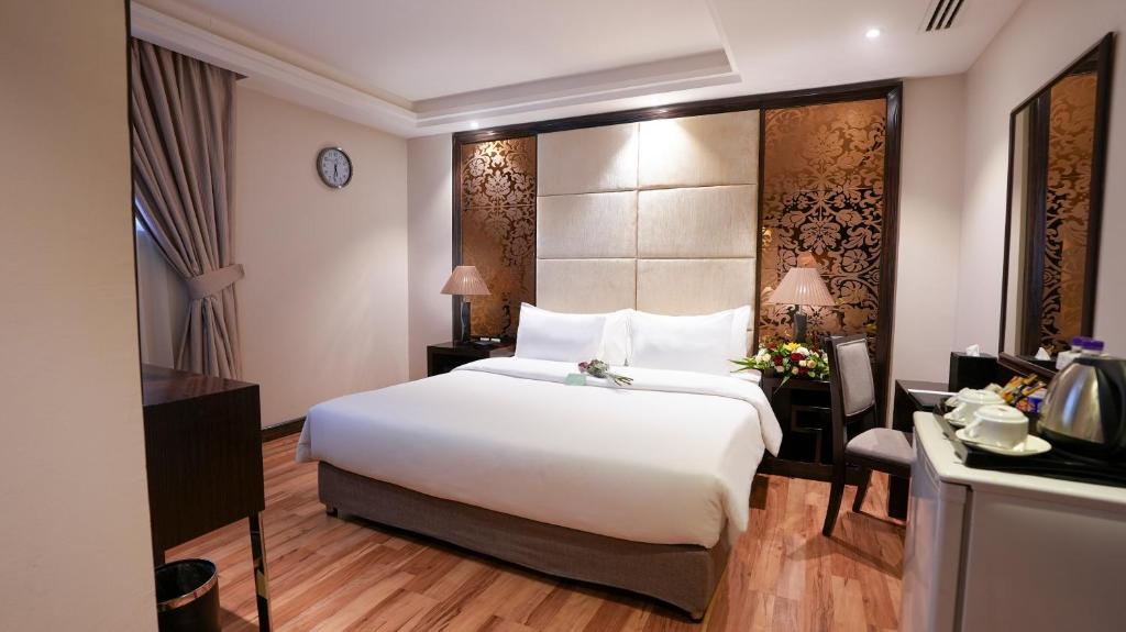 Postel nebo postele na pokoji v ubytování Boudl Al Majmaa