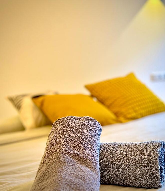 Postel nebo postele na pokoji v ubytování Suburban Loft