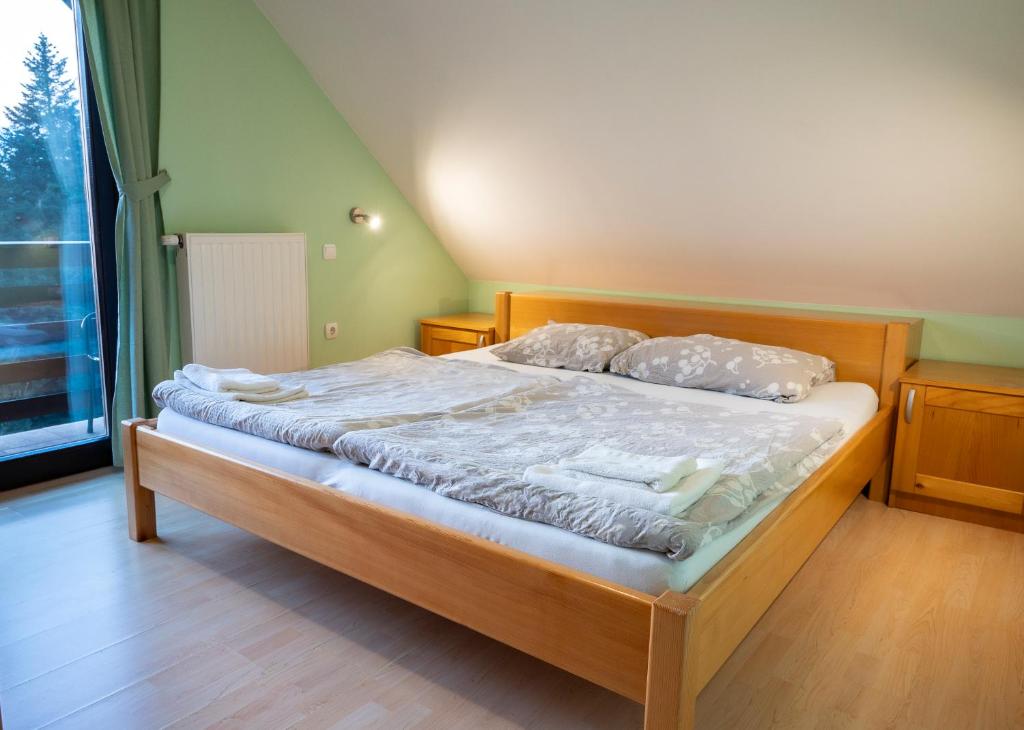 Postel nebo postele na pokoji v ubytování Apartments Jasa