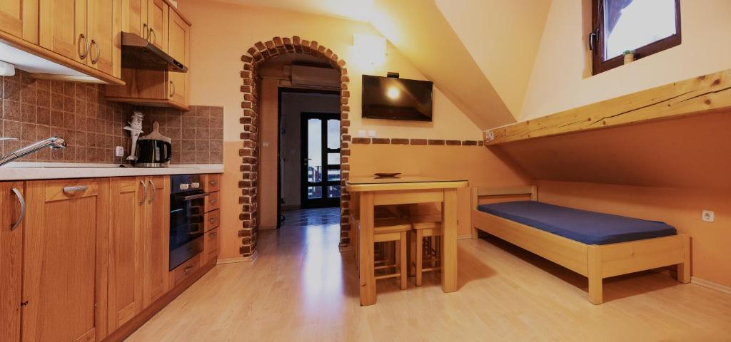 Kuchyň nebo kuchyňský kout v ubytování Apartments Jasa