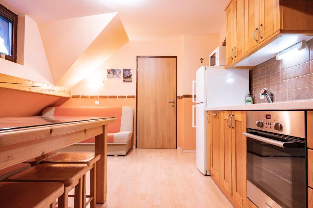 Kuchyň nebo kuchyňský kout v ubytování Apartments Jasa