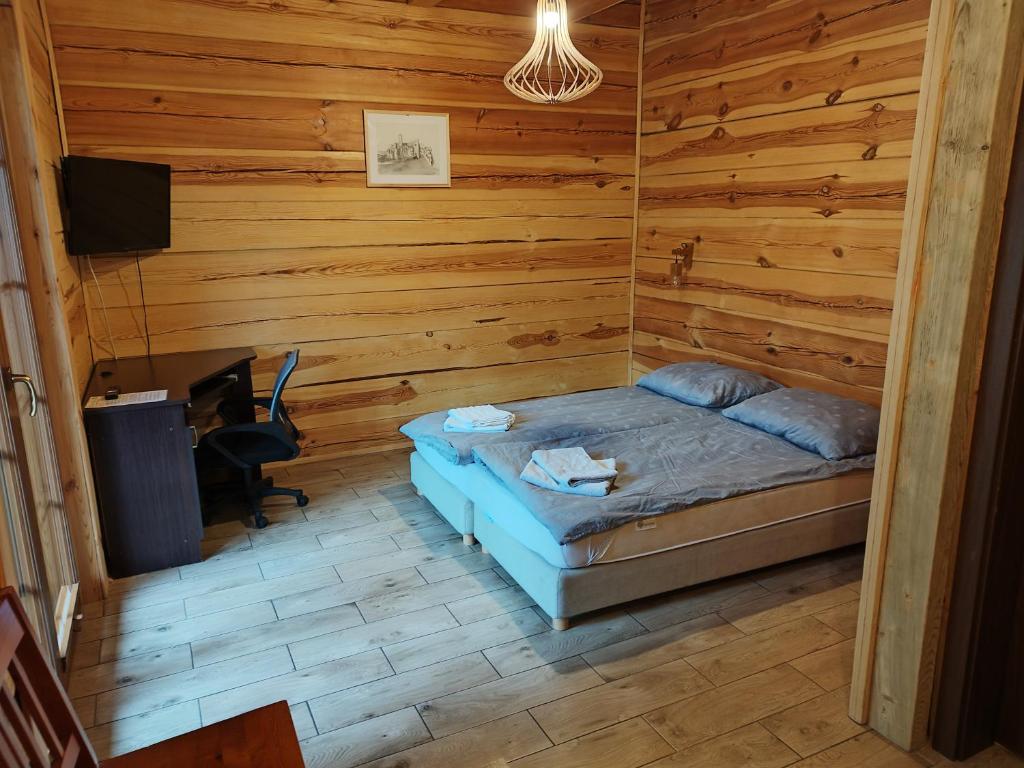 Postel nebo postele na pokoji v ubytování Chata Sosenka