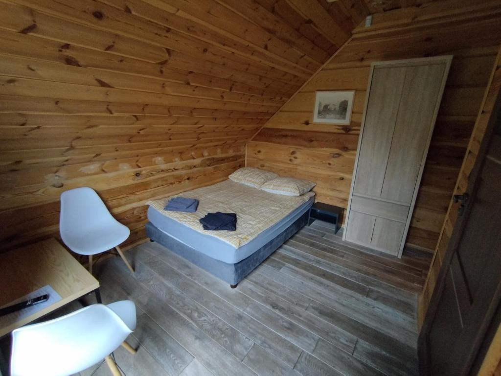 Postel nebo postele na pokoji v ubytování Chata Sosenka