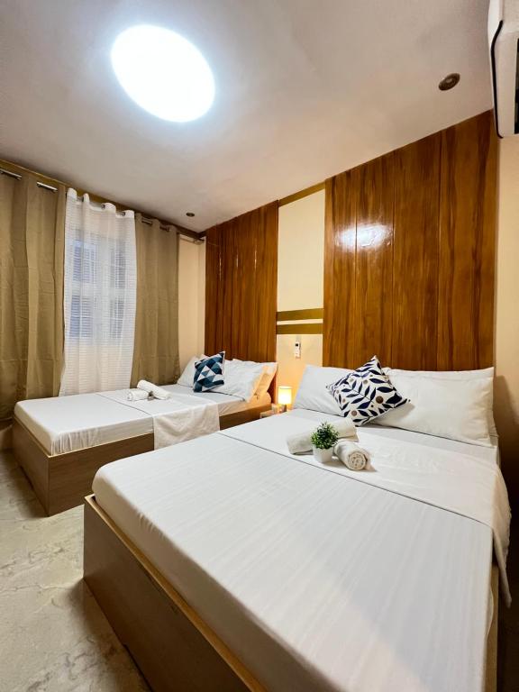 Postel nebo postele na pokoji v ubytování HOUSE LODGING by RICCOS