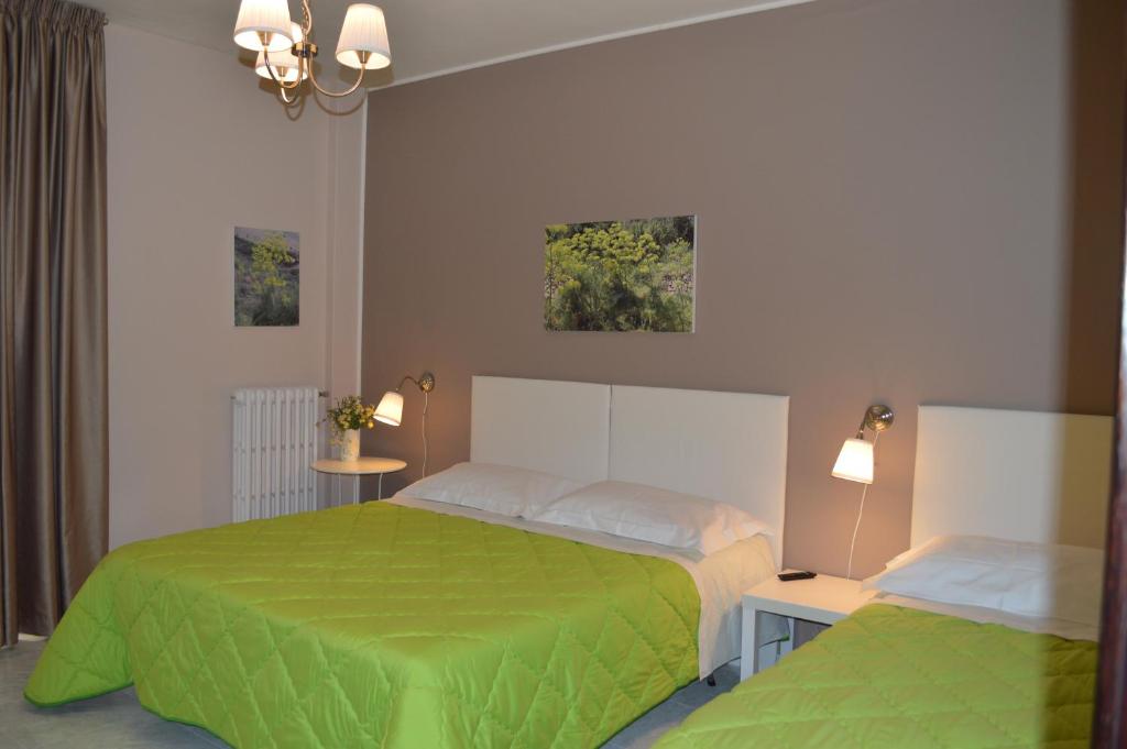 Posteľ alebo postele v izbe v ubytovaní Porta Matera B&b
