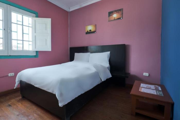 Postel nebo postele na pokoji v ubytování La Casa de Algodon