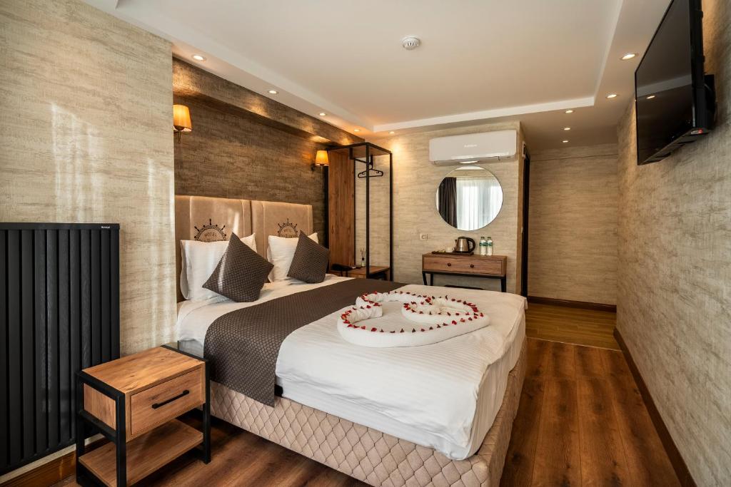 Postel nebo postele na pokoji v ubytování Old Harbour Hotel istanbul